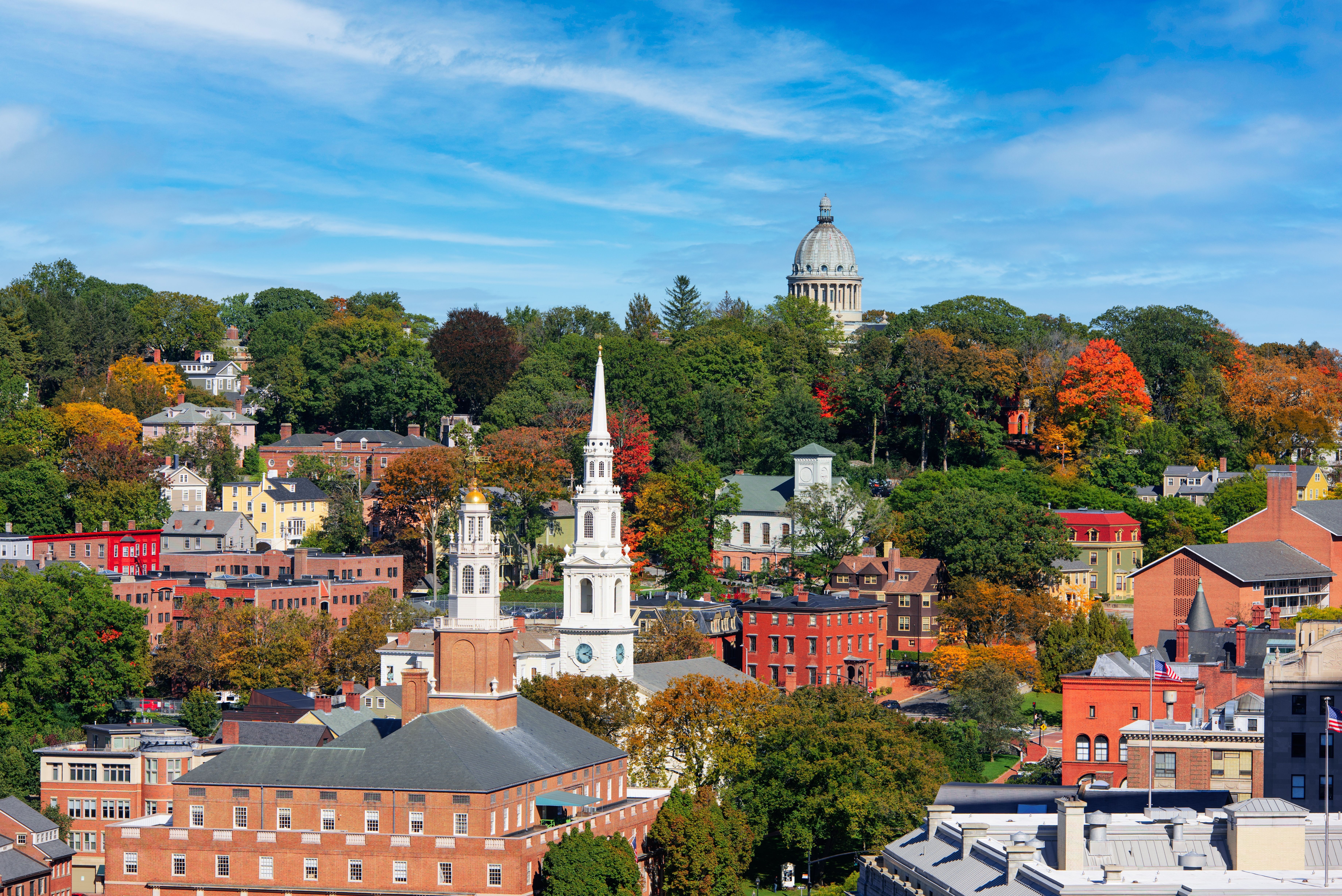 Rhode Island’s coastal charm and community appeal attract residents, but high costs, limited job diversity, and crowded summers may impact quality of life for some.